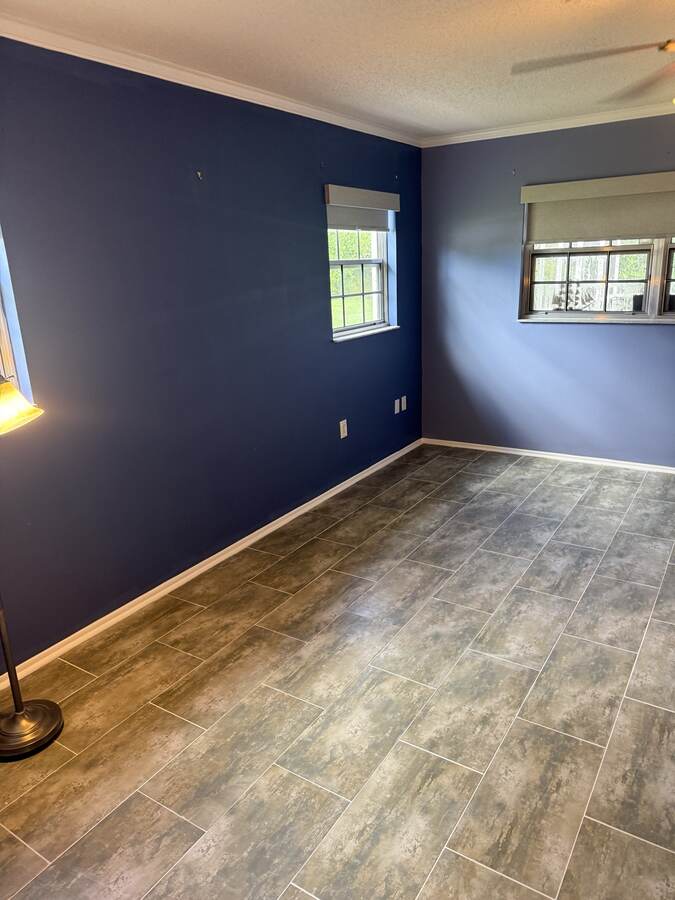 Additional view of the finished gray Hudson flooring