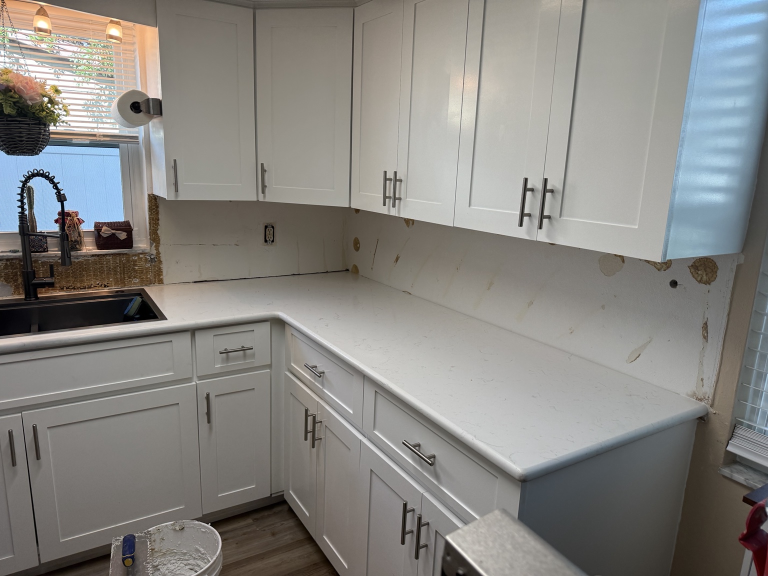 Port Richey kitchen wall preparation before backsplash tile installation by AG Holmes Handyman Services