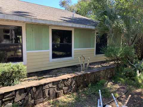 Siding and window trim work by AG Holmes Handyman Services
